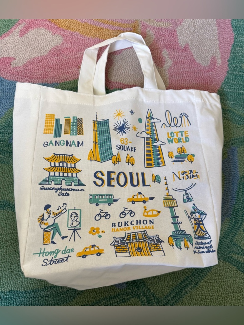 Seoul souvenir shopping tote. White with blue turquoise and yellow accents.